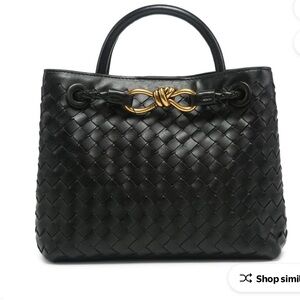 New black woven cross body bag